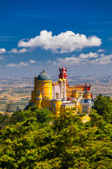 Palace of Pena in Sintra. Lisbon, Portugal. Travel Europe, holidays in Portugal. Panoramic View Of Pena Palace, Sintra, Portugal. Pena National Palace, Sintra, Portugal. - obrazy, fototapety, plakaty