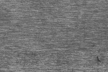 Cardboard black abstract texture close-up. Dark old paper background. Grunge concrete wall. Vintage blank wallpaper.