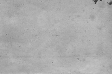 Cardboard black abstract texture close-up. Dark old paper background. Grunge concrete wall. Vintage blank wallpaper.
