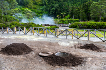 Cooking of Cozido Das Furnas meal, Sao Miguel, Azores. Hole in the ground for cooking Cozido das...