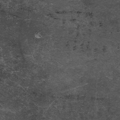 Cardboard black abstract texture close-up. Dark old paper background. Grunge concrete wall. Vintage blank wallpaper.