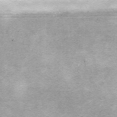 Cardboard black abstract texture close-up. Dark old paper background. Grunge concrete wall. Vintage blank wallpaper.