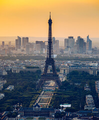 Obraz premium View of Paris with Eiffel Tower from Montparnasse building. Eiffel tower view from Montparnasse at sunset, view of the Eiffel Tower and La Defense district in Paris, France.