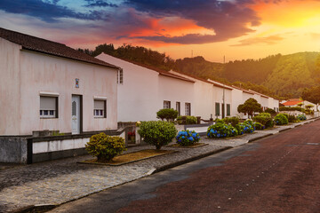 Fototapeta na wymiar Traditional houses, Sete Cidades, Sao Miguel Island, Azores. Beautiful view of Sete Cidades village in Sao Miguel Island, Azores, Portugal.