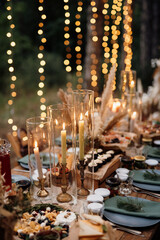 atmospheric candle decor with live fire on the banquet table