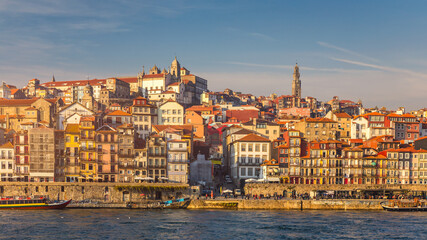 Fototapeta na wymiar Ancient city of Porto with old multi-colored houses with red roof tiles. Portugal, Porto