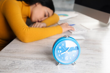 sleeping young woman in office