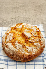 Fresh baked bread on vintage linen napkin