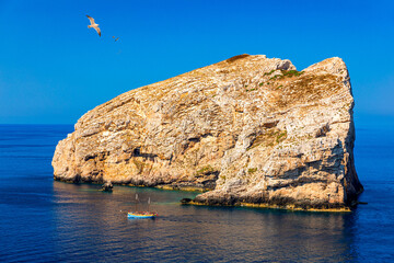 View from Capo Caccia on island Isola Foradada, Sardinia, Italy. Island Foradada at 