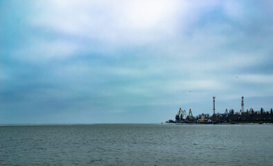 A cloudy sky with sea and sea line with the horizon shot