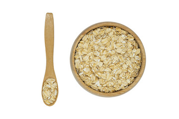 oatmeal flakes in wooden bowl and spoon isolated on white