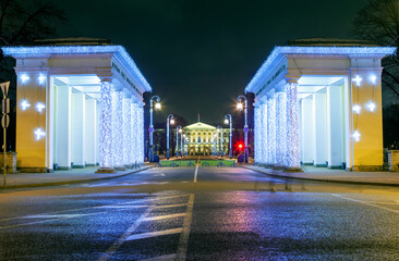 Colonnades of propylaea and the central portico of Smolny in the evening, with New Year...