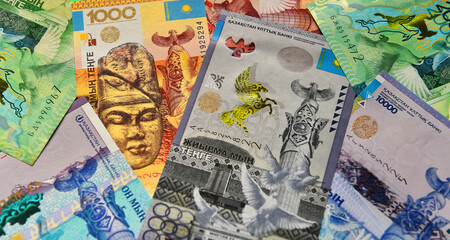 some tenge banknotes from the country of kazakhstan