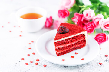 Red velvet cake with cream cheese filling in a plate for Valentine's day