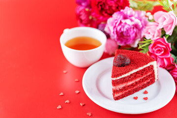 Red velvet cake with cream cheese filling in a plate for Valentine's day