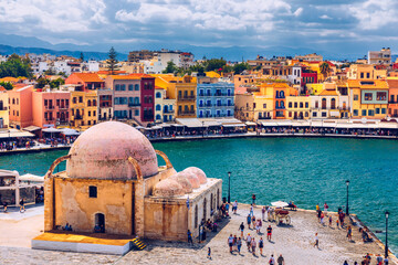 Picturesque old port of Chania. Landmarks of Crete island. Greece. Bay of Chania at sunny summer day, Crete Greece. View of the old port of Chania, Crete, Greece. The port of chania, or Hania.