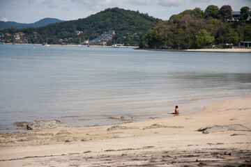 person walking on the beach