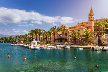 Fishing boats in Splitska village with beautiful port, Brac island, Croatia. Village of Splitska on...