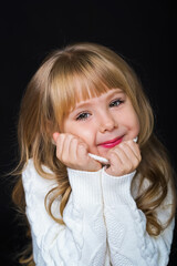 little girl in sweater