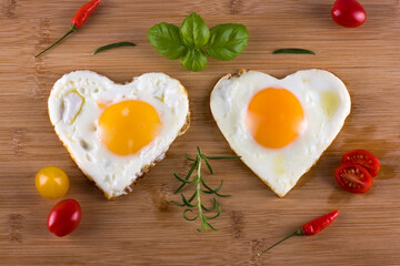 Fried eggs in the shape of a heart.