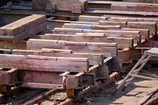 Shipyard for small boats that need repair. Slope of wood and metal on the water