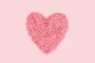 Heart shape candy pink hearts background of cake sprinkles in flat lay with copy space, feminine blogger or festive love gift and Valentine's Day concept. banner mockup. Small hearts minimal