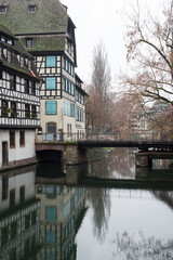 Fototapeta na wymiar view of mobil bridge on the channel little france quarter in Strasbourg by winter