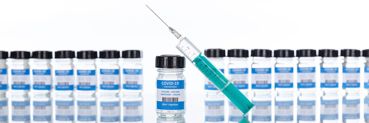 Coronavirus Vaccine bottle Corona Virus syringe COVID-19 Covid vaccines panoramic view