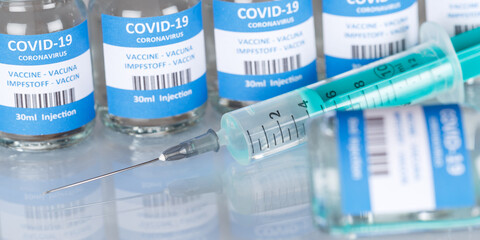 Coronavirus Vaccine bottle Corona Virus syringe COVID-19 Covid vaccines panoramic view