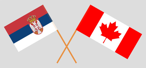 Crossed flags of Serbia and Canada