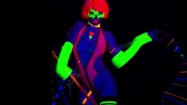 Video of UV glow female dancer
