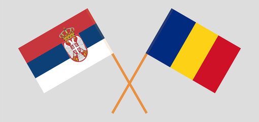 Crossed flags of Serbia and Romania