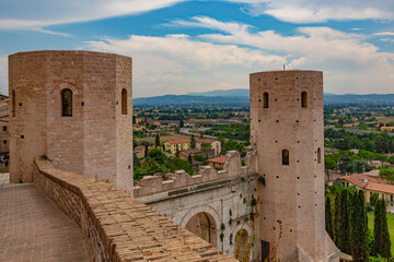 Obraz premium Narrow alleys and ancient medieval buildings in the picturesque town of Spello, in Umbria (Italy)