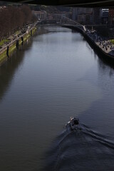 Fototapeta na wymiar Paddle board in the river of Bilbao