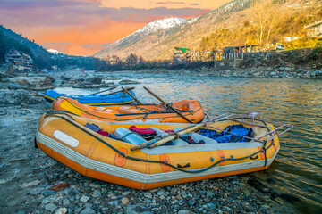 Rubber boats are in finishing point of rafting . Kullu valley in Himachal Pradesh 