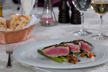 Delicious tuna steak with mixed vegetables and asparagus