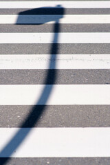 Fototapeta na wymiar Lantern Shadow On The Pedestrian Lane