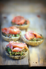 Selective focus. Fish burgers with salmon and avocado. Healthy snack. Healthy fast food.