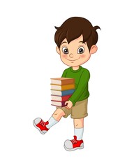 Happy cute little boy holding stack of books