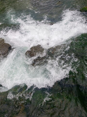 waves crashing on rocks