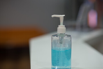 Fototapeta na wymiar Alcohol gel bottle for hand washing For cleanliness, killing germs, COVID-19, Coronavirus, Disease.