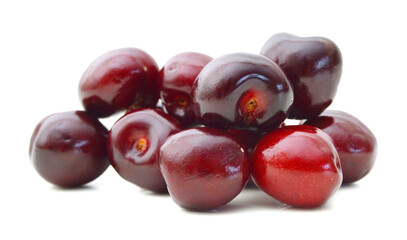 Handful of a red cherry on a white background