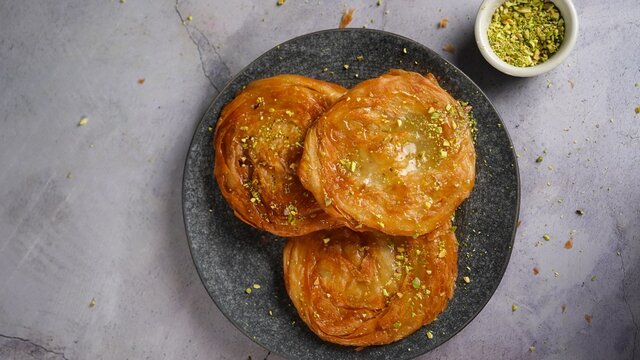 Fried Parotta / Sweet Porotta - Easy Khaja or Chiroti , selective focus
