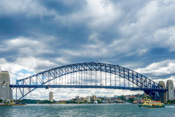 Australia, Sydney, Harbour Bridge seen from a boat in the Sydney Bay.