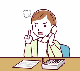 Young woman in a cardigan_Fixed-line phone