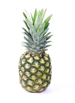 A pineapple isolated on a white background. Healthy food. Vegan food. © Michail