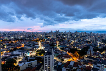 São Paulo with sunset and pink sky and night, metropolis, South America, Brazil