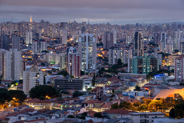 São Paulo with sunset and pink sky and night, metropolis, South America, Brazil