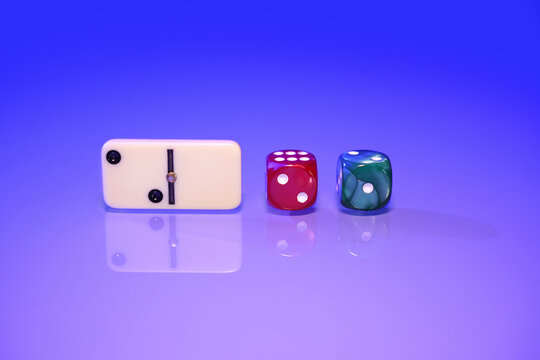 dice and domino showing 2021 on blue background