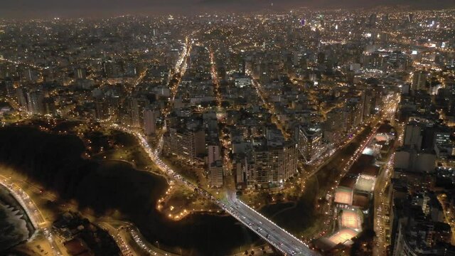 Aerial night view of lima city from Miraflores district, in Peru